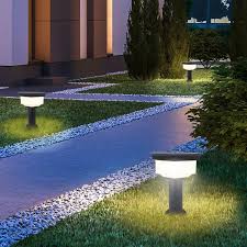 Solar bollard pathway lights at dusk